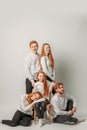 Sisters, brothers with natural red hair posing at camera