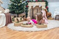 Sisters on Christmas eve at decorated living room with tradition Royalty Free Stock Photo