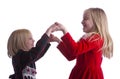 Sisters Dancing in Christmas Dresses