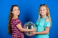 Sisters friends with disco ball. Lets start party. Cheerful kids hold disco ball. Disco dances. Retro music. Mirrors