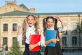 Sisters girls study together in school, successful graduation concept Royalty Free Stock Photo