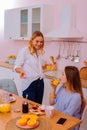 Sisters leading healthy lifestyle drinking freshly-squeezed juice