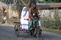 Sisters of Missionaries of Charity of Mother Teresa by rickshaw visit patients in the Sundarbans, West Bengal, Royalty Free Stock Photo