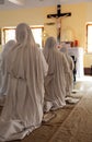 Sisters of Mother Teresa`s Missionaries of Charity in prayer in the chapel of the Mother House, Kolkata Royalty Free Stock Photo