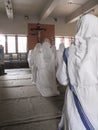 Sisters of Mother Teresa`s Missionaries of Charity in prayer in the chapel of the Mother House, Kolkata Royalty Free Stock Photo