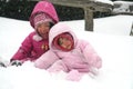 Sisters playing in the snow