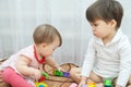 Sisters playing. Two little girls, baby and toddler. jealous child Royalty Free Stock Photo