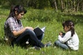 Sisters reading book together