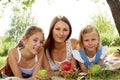 Sisters resting summer in the park Royalty Free Stock Photo