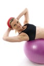 Sit ups middle age woman fitness core ball Royalty Free Stock Photo