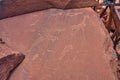 Site of ancient petroglyphs. Carved with giraffes, horses and other animals. Royalty Free Stock Photo