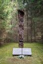Site and grave of mass massacre of Jews in the forest. Memorial monument in memory of holocaust
