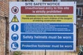 Site Safety Notice, construction site warning stating Keep Out! in yellow and blue on a white background Royalty Free Stock Photo