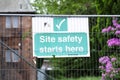 Site safety starts here sign at construction site Royalty Free Stock Photo
