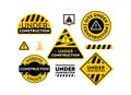 Site Under Construction Banners Set. Website Maintenance Warning Signs with Black and Yellow Stripes, and Tape or Cone Royalty Free Stock Photo