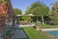 Sitting Area By Pool In House Backyard