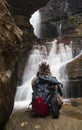 Bushwalker in awe of the waterfalls