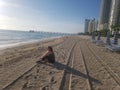 Sitting on the Beach at Sunrise Royalty Free Stock Photo