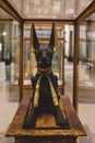 Sitting Black and Gold Statue of Ancient Egyptian God of Death Anubis in Cairo Museum