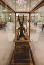 Sitting Black and Gold Statue of Ancient Egyptian God of Death Anubis in Cairo Museum