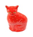 Sitting bright red ceramic cat