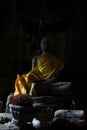 Sitting Buddha illuminated by sunlight in Angkor Wat Royalty Free Stock Photo