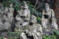 The Sitting Buddha between hundreds of Buddha statues of Japanese style.