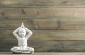 Sitting buddha monk wooden background Meditation Royalty Free Stock Photo