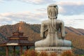 Sitting Buddha statue at the mountain