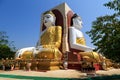 Sitting Buddha statues at the Kyaik Pun Pagoda in Bago