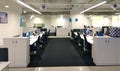 Chair row and computers in the work station an information technology company. Royalty Free Stock Photo