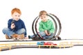 Sitting children playing kids racing toy car game