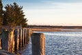 Sitting at the dock of the bay in Gardiner`s Bay New York at sunset Royalty Free Stock Photo