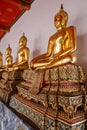 Sitting Golden Buddhas in Wat Pho temple in Bangkok