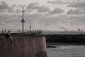 Sitting on harbour pier