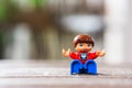 Sitting Lego Duplo boy figurine