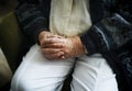 Sitting senior man close up on his holding hands Royalty Free Stock Photo