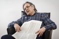 Sitting senior man reading newspaper Royalty Free Stock Photo