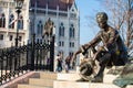 Sitting statue of the Hungarian poet Attila Jozsef near the parliament in Budapest