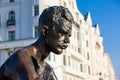 Sitting statue of the Hungarian poet Attila Jozsef near the parliament in Budapest