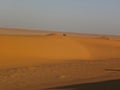 Sitting in the top of the dune, wasting time Royalty Free Stock Photo