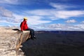Hiker on mountain ledge - risk freedom adventure s