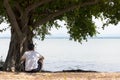 Sitting under a tree Lake.