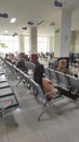 Sitting and waiting in waiting room - stock photo