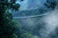 Situ Gunung suspension bridge at misty morning