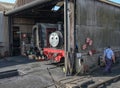 Children`s well-know train character seen on a full size steam locomotive. Royalty Free Stock Photo