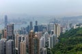 View on Skyscrapers with Victoria Bay, Transportation Ships, Harbour and Kowloon taken from Hongkong Island Peak. Hong Kong, China