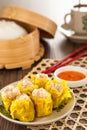 Siu Mai - Chinese steamed pork dumplings in bamboo steamers. Dim Sum Royalty Free Stock Photo