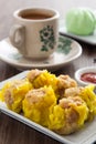 Siu Mai - Chinese steamed pork dumplings in bamboo steamers. Dim Sum Royalty Free Stock Photo