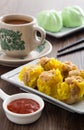 Siu Mai - Chinese steamed pork dumplings in bamboo steamers. Dim Sum Royalty Free Stock Photo